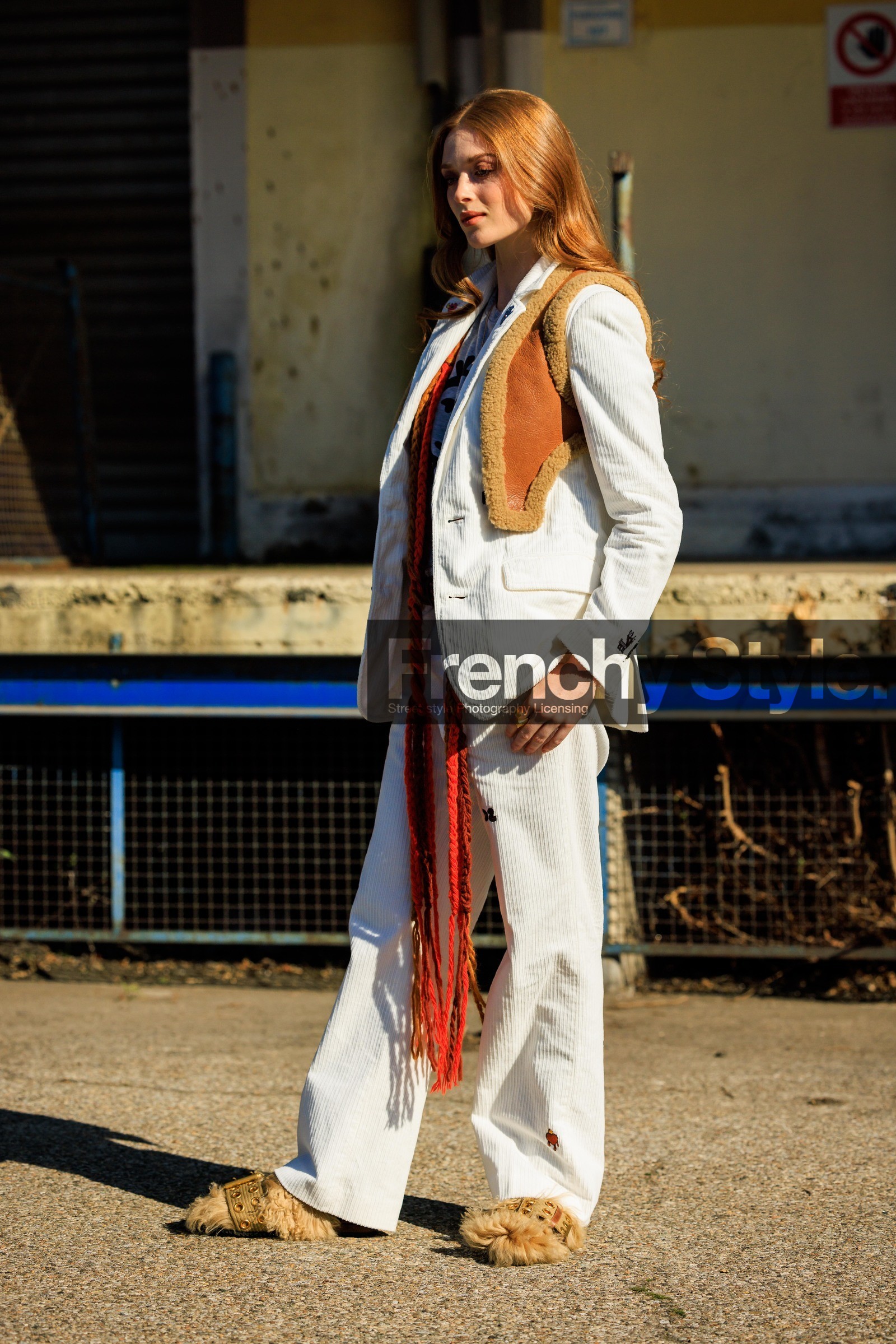 corduroy suit, ginger hair, white suit, leather cropped vest, brown vest, red braided scarf, printed tshirt, grey tshirt, brown belt, leather belt, furry shoes, leather slippers, larsen thompson, fashion week, frenchystyle, FW, jonathan paciullo, street style, vertical, full length