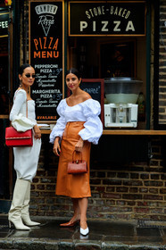 bettina looney, anna rosa vitiello, black earrings, carrot pants, chain strap bag, dangling earrings, high boots, high waist pants, loose pants, metalic frame sunglasses, plastic earrings, red leather bag, shoulder bag, tight top, white leather boots, white pants, white top, white total look, quilted bag, half soulder top, balloon sleeves, long sleeves top, camel skirt, leather skirt, mid long skirt, sharp end shoes, different shoes, white slippers, camel slippers, animal skin bag, hand bag, brown leather bag, ankle bracelet, fashion week, frenchystyle, FW, jonathan paciullo, street style, vertical, full length