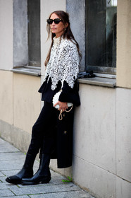 chloe loulou de saison, white cape, lace cape, white leather bag, white bag, shell bag, shell frame bag, bottega veneta sunglasses, chanel bag, black sunglasses, black coat, black pants, black leather boots, flat boots, hoop earrings, golden earrings, silvered earrings, multi earrings, black and white look, PARIS, PFW, fashion week, frenchystyle, FW, jonathan paciullo, street style, SPRING SUMMER 2021, SS 21, vertical, full length