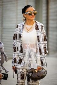 louis vuitton, sunglasses, white sunglasses, chained necklace, locked necklaces, white top, silk shirt, silk pants, logo pants, logo shirt, printed shirt, printed pants, duck shape bag, louis vuitton bag, monogram bag, golden earrings, fashion week, frenchystyle, FW, jonathan paciullo, street style, PFW, PARIS, menswear, FALL WINTER 2022-2023, AUTUMN WINTER 2022-2023, FW 22-23, atmosphere details, detail, vertical