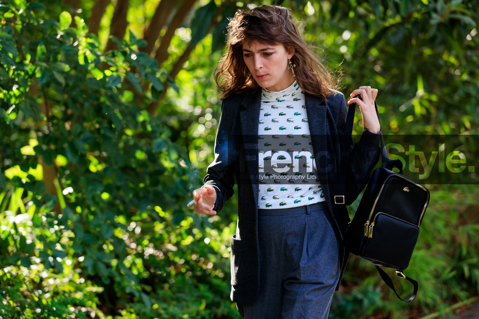 dark grey jacket, dark grey pants, dark grey suits, carrot pants, white top, tight top, monogrammed top, animal print top, green top, sportswear top, high collar top, lacoste bag, lacoste top, backpack, black leather bag, dangling earrings, green stone earrings, cross shape earrings, PARIS, PFW, SPRING SUMMER 2020, SS 20, fashion week, frenchystyle, FW, jonathan paciullo, street style, horizontal, atmosphere details, detail