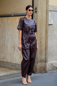 deborah reyner sebag, leather pants, leather shirt, leather total look, short sleeves shirt, brown shirt, brown pants, aviator sunglasses, metalic frame sunglasses, piaget bracelet, golden bracelet, golden necklace, chain necklace, chain detail shoes, squared toed shoes, beige leather shoes, bottega veneta shoes, diamond earrings, fashion week, frenchystyle, FW, jonathan paciullo, street style, MFW, MILAN, SPRING SUMMER 2020, SS 20