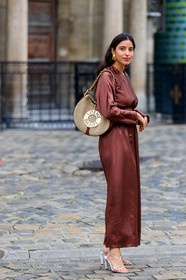 bettina looney, brown dress, long sleeves dress, long dress, silk dress, belted dress, loewe bag, shoulder bag, brown leather bag, golden earrings, big earrings, straw bag, chain strap bag, white leather sandals, high heels sandals, multi straps sandals, fashion week, frenchystyle, FW, jonathan paciullo, street style, PFW, PARIS, SPRING SUMMER 2020, SS 20, horizontal, full length
