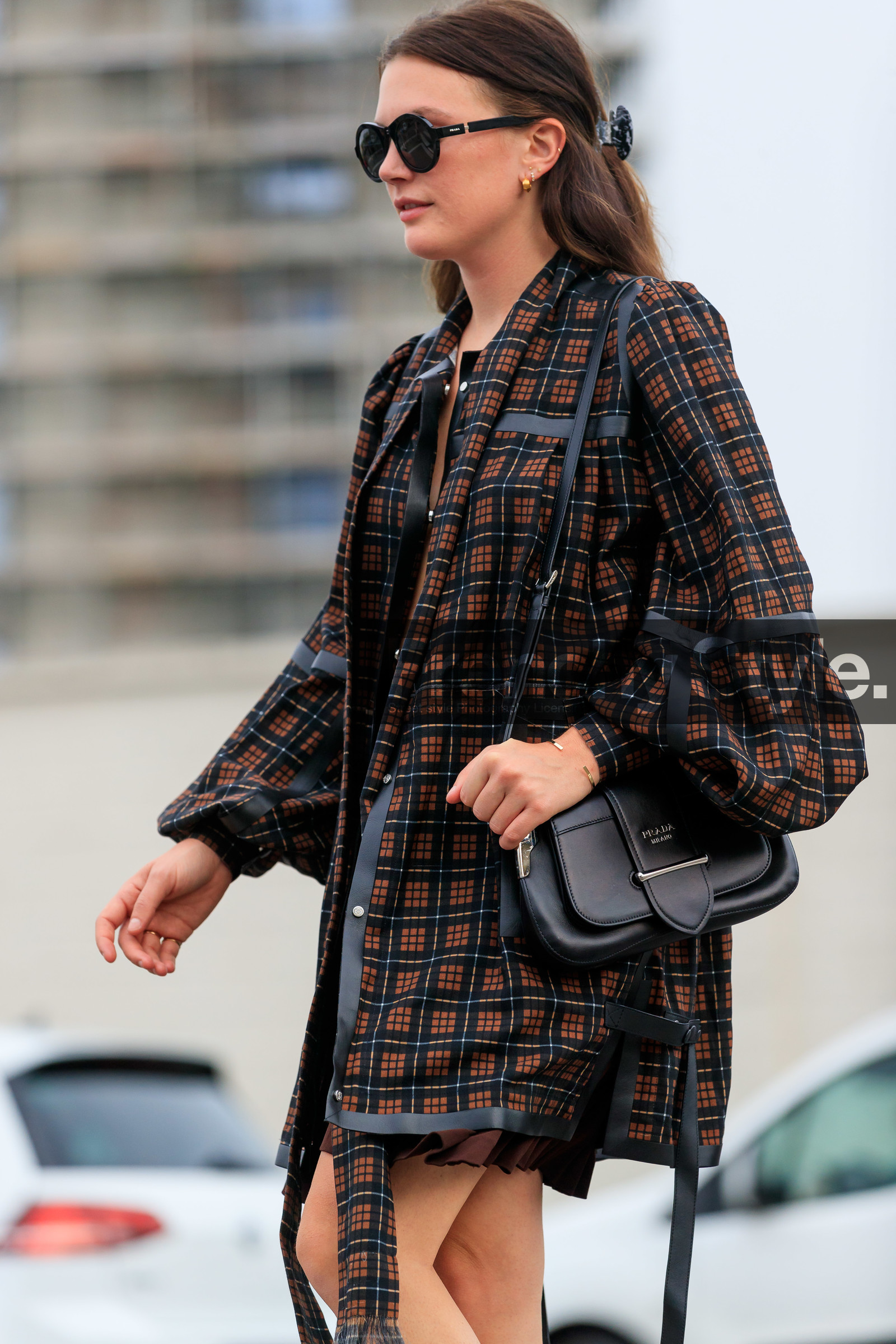 madelynn furlong, checked shirt, checked jacket, black jacket, red jacket, red shirt, black shirt, long shirt, long sleeves shirt, prada bag, shoulder bag, black leather bag, prada sunglasses, brown skirt, pleated skirt, fashion week, frenchystyle, FW, jonathan paciullo, street style, MFW, MILAN, SPRING SUMMER 2020, SS 20