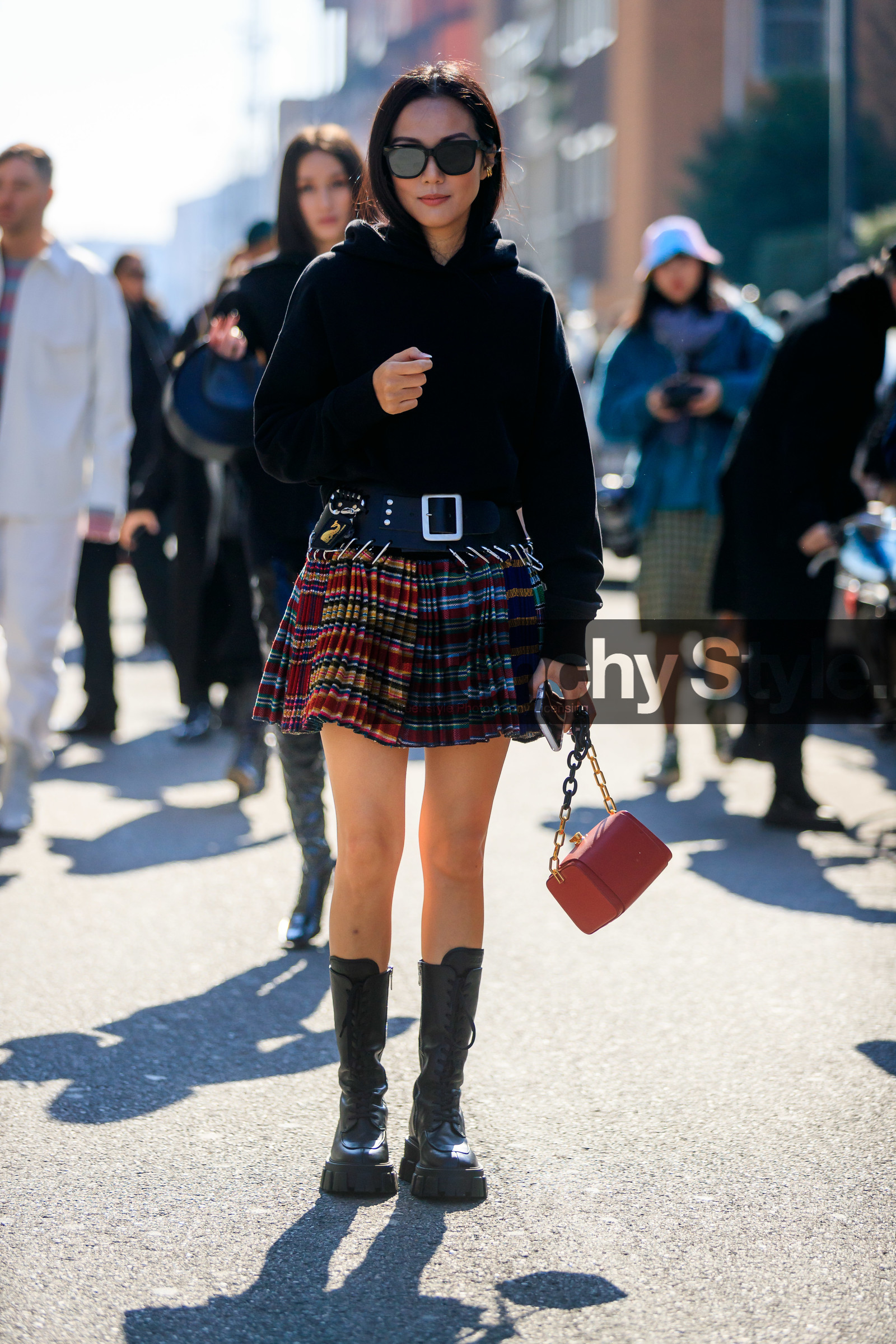yoyo cao, mini skirt, pleated skirt, checked skirt, black leather belt, black hoodie, black leather boots, red leather bag, multicolor skirt, big strap bag, flat boots, prada boots, big sole boots, laced boots, fashion week, frenchystyle, FW, jonathan paciullo, street style, MFW, MILAN, AUTUMN WINTER 2020-2021, FALL WINTER 2020-2021, FW 20-21, vertical, full length
