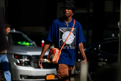 balenciaga, black hat, blue t shirt, bucket hat, camel pants, comme des garçons, graphic bag, graphic top, leather bag, leather shoes, Marc-Henri Ngandu, necklace, orange bag, printed bag, printed t shirt, trousers, fashion week, frenchystyle, FW, jonathan paciullo, street style, NEW YORK, NYFW, SPRING SUMMER 2020, SS 20, horizontal, atmosphere details, detail