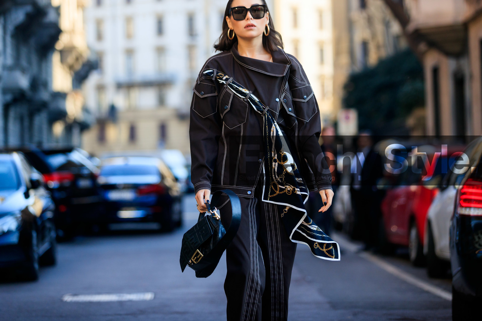 karina nigay, brown jacket, brown jeans, brown pants, wrap jacket, scarf detail, scarf, asymetrical jacket, black leather bag, monogrammed bag, fendi bag, hoop earrings, golden earrings, printed scarf, black scarf, striped jacket, striped jeans, striped pants, multi pocket jacket, square shape glasses, fashion week, frenchystyle, FW, jonathan paciullo, street style, MFW, MILAN, AUTUMN WINTER 2020-2021, FALL WINTER 2020-2021, FW 20-21, horizontal, atmosphere details, detail