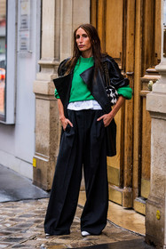 bag, bicolor bag, black and white bag, black coat, black pants, chanel bag, Chloé Harrouche, coat, flare pants, fluid pants, green sweater, large pants, leather coat, pants, sweater, fashion week, frenchystyle, FW, jonathan paciullo, street style, PFW, PARIS, SPRING SUMMER 2022, SS 22, vertical, full length