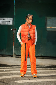 orange look, sleeveless vest, orange puffed vest, curls, 90s look, details, white cropped top, puffed pants, orange pants, orange sneakers, chunky sneakers, orange sunglasses, street style, jonathan paciullo, FW, frenchystyle, fashion week, NYFW, NEW YORK, AUTUMN WINTER 2022-2023, FALL WINTER 2022_2023, FW 22-23, vertical, full length