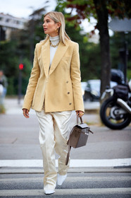 xenia adonts, light yellow jacket, beige jacket, white pullover, white pants, satin pants, turtleneck pullover, loose pants, hermes jacket, golden necklace, golden earrings, golden ring, multi earrings, big chain necklace, brown leather bag, hermes bag, kelly hermes bag, hoop earrings, mini hoop earrings, diamond earrings, white total look, beige total look, fashion week, frenchystyle, FW, jonathan paciullo, street style, PFW, PARIS, SPRING SUMMER 2021, SS 21, vertical, full length