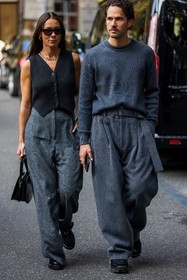 Alice Barbier, belted pants, black bag, black shoes, cardigan, couple, duo, gold chain, grey knit, grey monochrome, Jean-Sebastien Roques, knit, large pants, leather bag, leather shoes, menswear, monochrome, oversize pants, ribbed cardigan, sleveless cardigan, wool pants, sunglasses, black sunglasses, necklace, gold earrings, fashion week, frenchystyle, FW, jonathan paciullo, street style, MFW, MILAN, SPRING SUMMER 2022, SS 22, vertical, full length