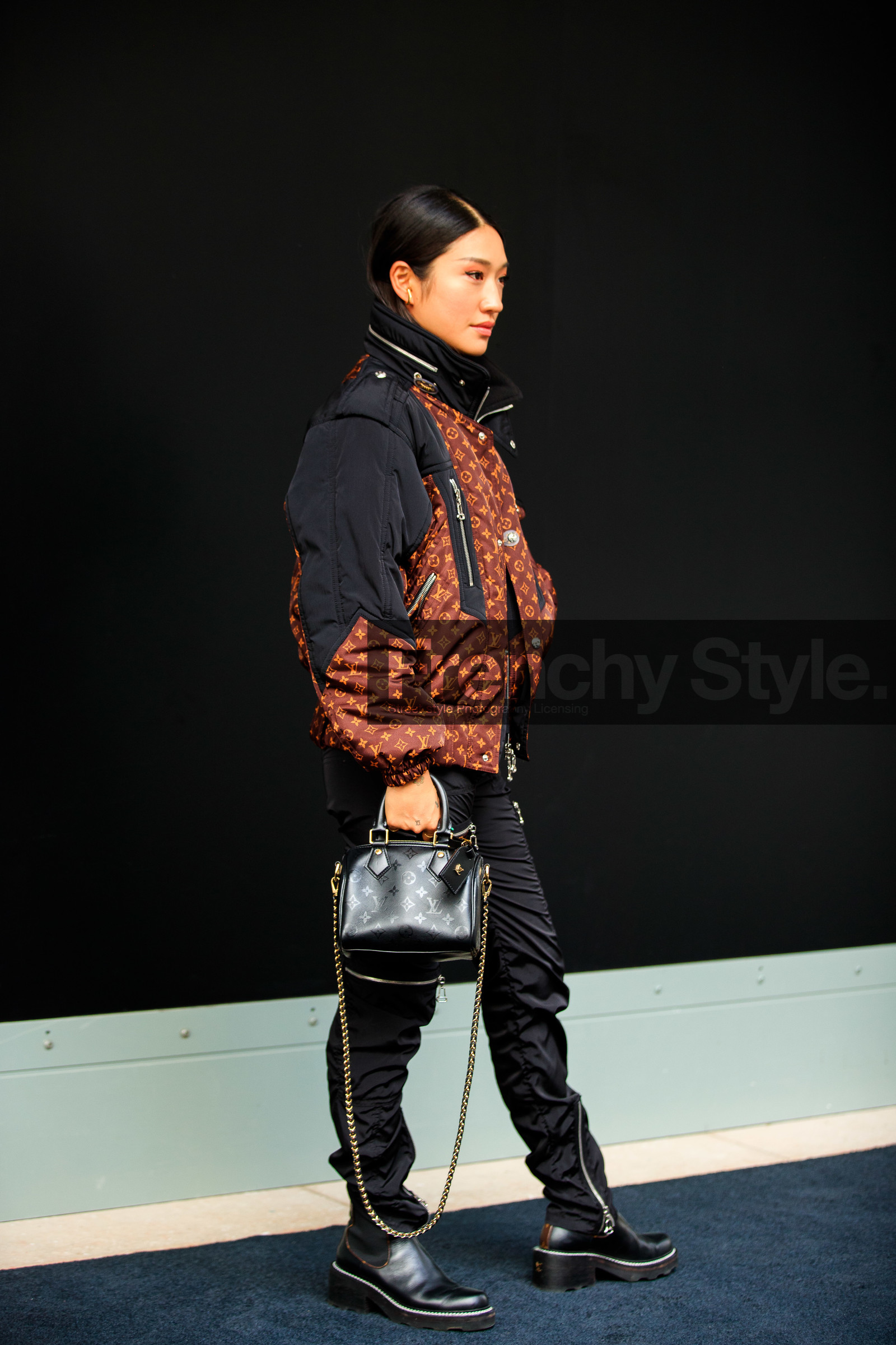 peggy gould, black coat, black pants, black leather bag, black leather boots, brown coat, down jacket, zipped coat, monogrammed coat, monogrammed pants, monogrammed bag, chelsea boots, flat boots, hand bag, bowling bag, PARIS, PFW, fashion week, frenchystyle, FW, jonathan paciullo, street style, SPRING SUMMER 2021, SS 21, vertical, full length