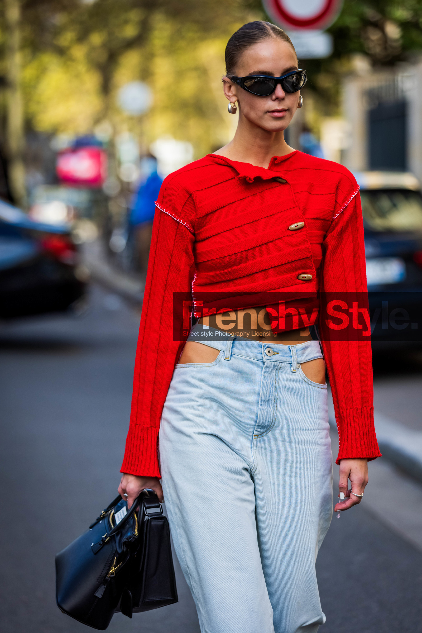asymetrical knitwear, bag, black bag, black sunglasses, cut out pants, denim, earrings, Hilda Sandstrom, jean, knitwear, light blue denim, light blue jean, red knitwear, sunglasses, street style, jonathan paciullo, FW, frenchystyle, fashion week, PFW, PARIS, SPRING SUMMER 2022, SS 22, vertical, atmosphere details