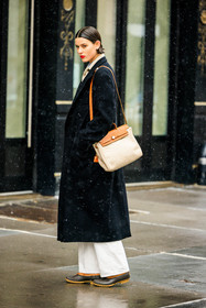 black coat, winter coat, hermes handbag, crossbody bag, hermes crossbody, short hair, red lips, casual chic style, wideleg pants, white pants, brown boots, fashion week, frenchystyle, FW, jonathan paciullo, street style, NYFW, NEW YORK, AUTUMN WINTER 2022-2023, FALL WINTER 2022_2023, FW 22-23, vertical, full length, model
