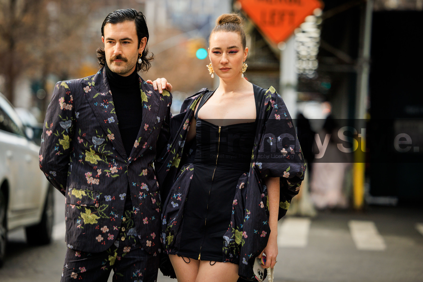 mini black dress, zipped mini dress, couples matching, high bow tail, pendant earring, printed jacket, flowered jacket, flower suit, printed suit, black turtleneck, young emperors, street style, jonathan paciullo, FW, frenchystyle, fashion week, NYFW, NEW YORK, AUTUMN WINTER 2022-2023, FALL WINTER 2022_2023, FW 22-23, atmosphere details, horizontal
