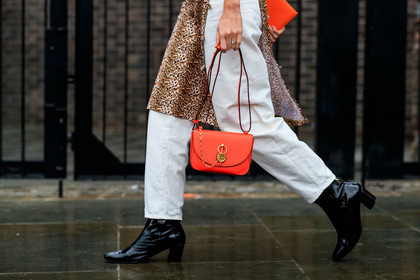 black vinyl boots, high heels boots, white jeans, boyfriend jeans, animal print dress, split dress, wearemarcia dress, j w anderson bag, orange leather bag, hand bag, close up detail, bag detail, fashion week, frenchystyle, FW, jonathan paciullo, street style, atmosphere details, horizontal, detail