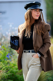 sophia roe, brown jacket, black cap, leather cap, oversize jacket, light beige pants, velvet pants, corduroy pants, hermes belt, black leather clutch, black leather belt, loose pants, silvered watch, rolex watch, PARIS, PFW, fashion week, frenchystyle, FW, jonathan paciullo, street style, SPRING SUMMER 2021, SS 21, vertical, atmosphere details, detail