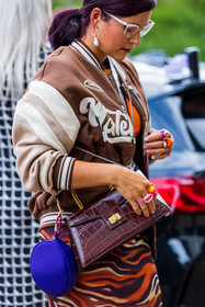 crossbody bag, handbag, pattern, print, baseball jacket, bomber jacket, skirt, jacket, earrings, glasses, ring, orange, fashion week, frenchystyle, FW, jonathan paciullo, street style, SPRING SUMMER 2022, SS 22, LFW, LONDON, vertical, atmosphere details, detail