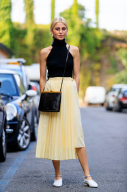 black bag, black top, caro daur, earrings, leather bag, leather shoes, pleated skirt, sunglasses, white shoes, yellow skirt, fashion week, frenchystyle, FW, jonathan paciullo, street style, MFW, MILAN, SPRING SUMMER 2019, SS 19, vertical, full length