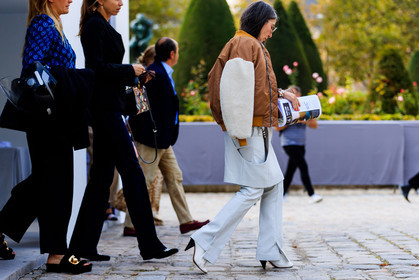 atmosphere details, bomber jacket, brown jacket, fashion week, frenchystyle, full length, FW, high heels, horizontal, jonathan paciullo, leather shoes, over the shoulder, PARIS, PFW, shearling, SPRING SUMMER 2018, SS 18, street style, trousers, Véronique Tristram, white pants, white shoes