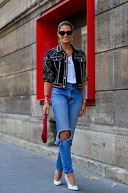 black jacket, blue denim, denim pants, embroidered jacket, graphic jacket, high heels, jeans, leather bag, leather shoes, necklace, red bag, ripped pants, studs, sunglasses, trousers, white shoes, white t shirt, PFW, fashion week, frenchystyle, FW, jonathan paciullo, street style, PARIS, vertical, full length, AUTUMN WINTER 2018-2019, FALL WINTER 2018-2019, FW 18-19, helena bordon