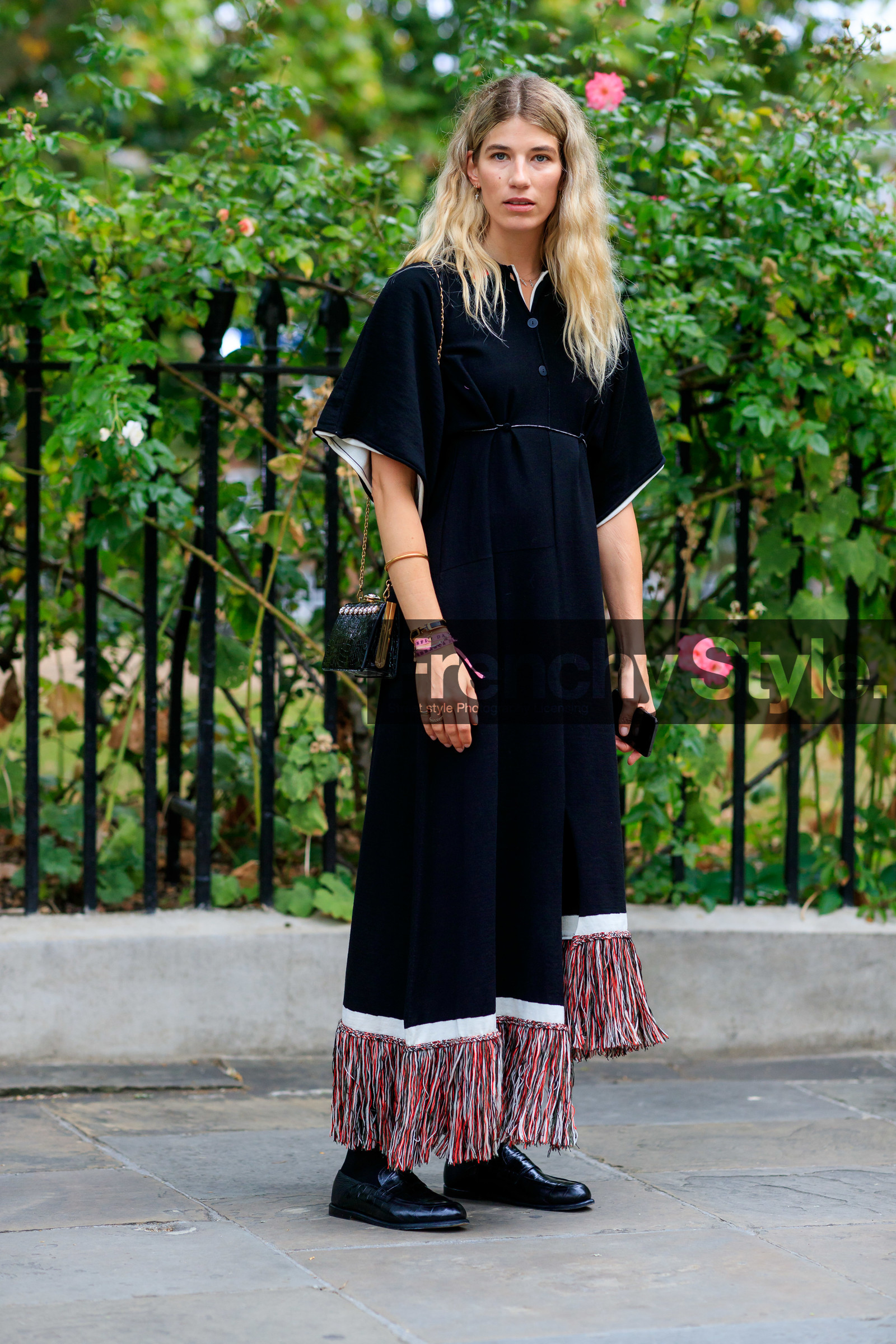 veronika heilbrunner, black dress, fringe dress, red dress, short sleeves dress, long dress, black socks, black loafers, animal skin shoes, animal skin bag, strassed bag, black leather bag, chain strap bag, hermes bracelet, fashion week, frenchystyle, FW, jonathan paciullo, street style, vertical, full length