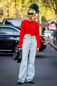 asymetrical knitwear, bag, black bag, black sunglasses, cut out pants, denim, earrings, Hilda Sandstrom, jean, knitwear, light blue denim, light blue jean, red knitwear, sunglasses, street style, jonathan paciullo, FW, frenchystyle, fashion week, PFW, PARIS, SPRING SUMMER 2022, SS 22, vertical, full length
