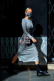 leonie hanne, silvered dress, tight dress, long dress, long sleeves dress, black leather boots, low boots, chelsea boots, flat boots, big sole boots, motard boots, paco rabanne bag, paco rabanne dress, crossbody bag, metalic bag, silvered bag, silvered chain strap bag, floral embroidered bag, plastic bag, strassed earrings, round shape earrings, big earrings, PARIS, PFW, fashion week, frenchystyle, FW, jonathan paciullo, street style, SPRING SUMMER 2021, SS 21, vertical, full length