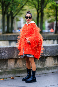 dana hourani, orange coat, white hoodie, letter embroidered pullover, valentino look, black leather boots, flat boots, chelsea boots, black sunglasses, futurist shape sunglasses, PARIS, PFW, SPRING SUMMER 2020, SS 20, fashion week, frenchystyle, FW, jonathan paciullo, street style, vertical, full length