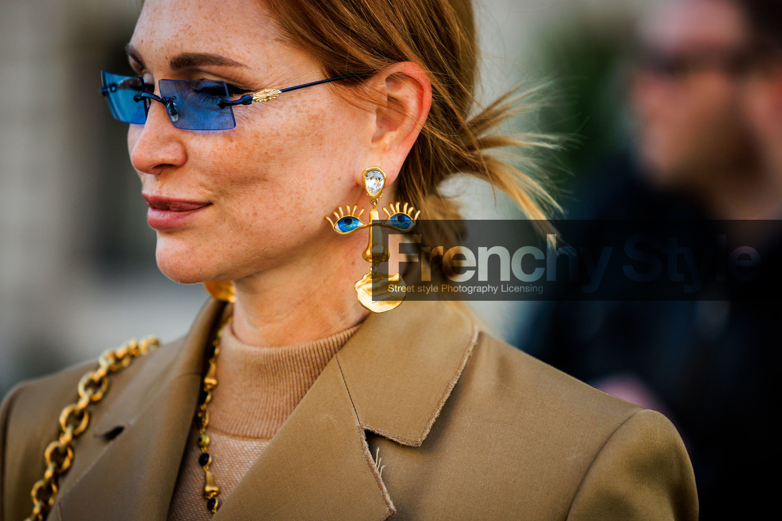 details, close up, schiaparelli, golden earrings, face earrings, blue sunglasses, golden chain, freckles, fashion week, frenchystyle, FW, jonathan paciullo, street style, PARIS, PFW, SPRING SUMMER 2022, SS 22, atmosphere details, detail, horizontal