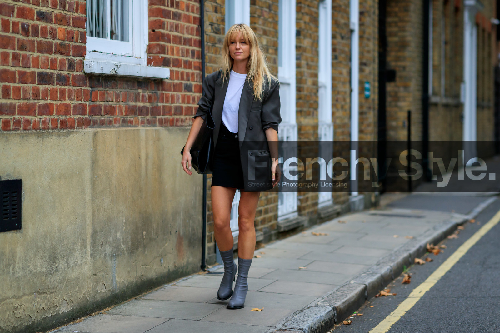 jeanette madsen, dark grey jacket, oversize jacket, white top, black denim skirt, mini skirt, grey leather boots, high heels boots, fashion week, frenchystyle, FW, jonathan paciullo, street style, atmosphere details, horizontal, full length
