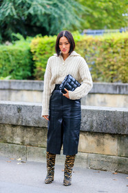 Tiffany Hsu, white pullover, zipped pullover, black leather bag, black leather skirt, plaited leather bag, plaited bag, bottega veneta bag, mid long skirt, split skirt, fur boots, animal printed boots, black boots, camel boots, PARIS, PFW, SPRING SUMMER 2020, SS 20, fashion week, frenchystyle, FW, jonathan paciullo, street style, vertical, full length