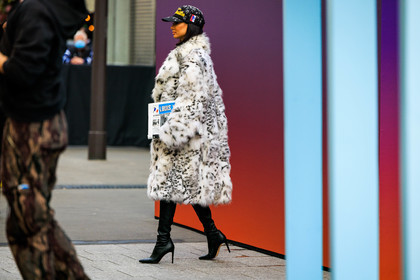 louis vuitton, furry coat, white coat, animal print coat, black boots, highknee boots, heeled boots, leather boots, newspaper, black cap, printed cap, fashion week, frenchystyle, FW, jonathan paciullo, street style, PFW, PARIS, menswear, FALL WINTER 2022-2023, AUTUMN WINTER 2022-2023, FW 22-23, full length, horizontal