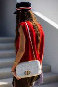 back, back detail, bag, brown pants, cap, cargidan, chain bag, checked pants, dior bag, Estelle Chemouny, gold bracelet, leather bag, logo print, pants, print, quilted bag, red cardigan, red knit, rings, sleveless knit, tartan pants, velvet cap, white bag, street style, jonathan paciullo, FW, frenchystyle, fashion week, PFW, PARIS, SPRING SUMMER 2022, SS 22, vertical, atmosphere details