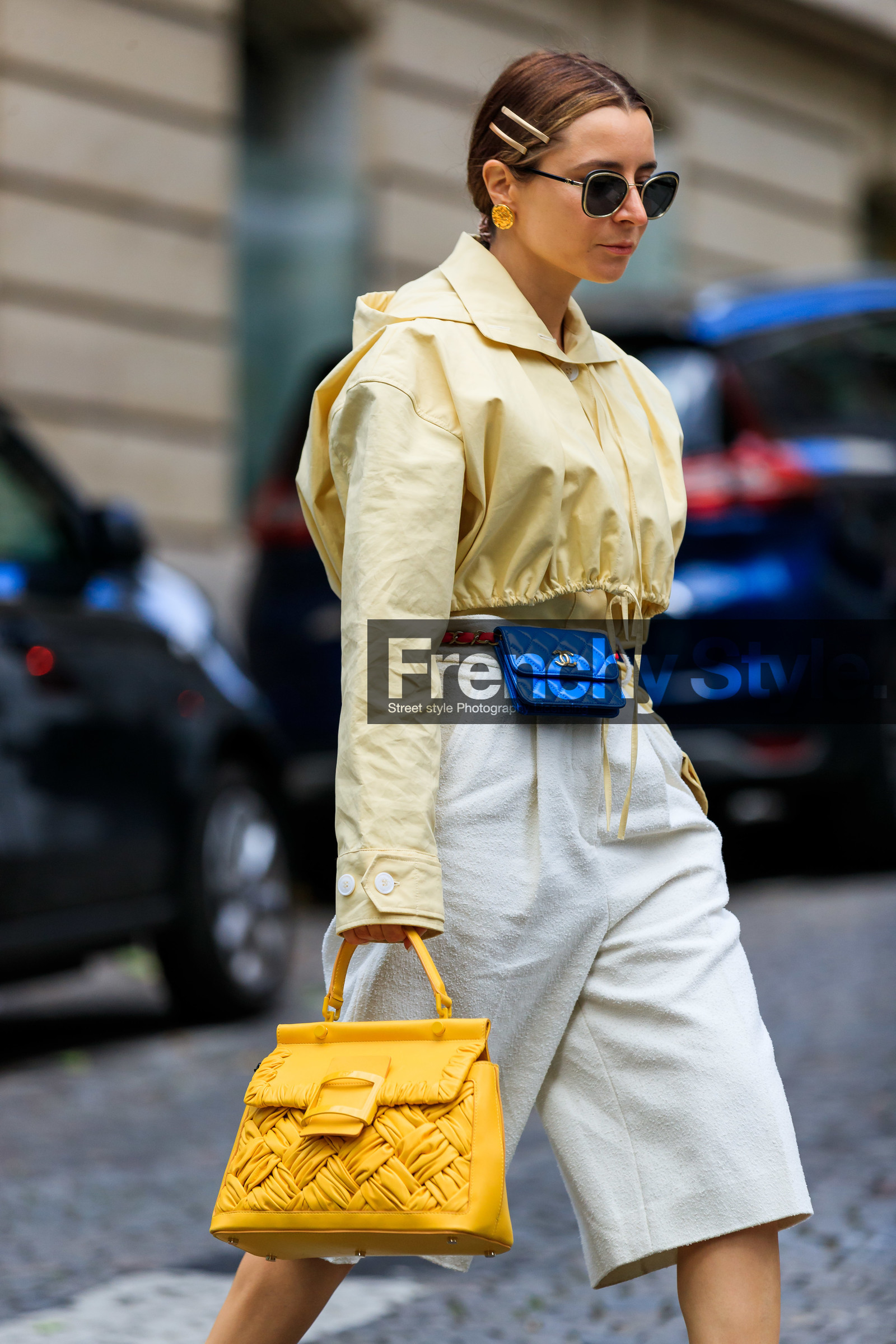 white bermuda shorts, light yellow blouse, light yellow shirt, light yellow top, yellow bag, yellow blouse, yellow shirt, yellow leather bag, hand bag, plaited bag, roger vivier bag, blue leather bag, blue leather belt, quilted bag, quilted belt, mini bag, belt bag, chain belt, golden earrings, chanel bag, chanel belt, chanel earrings, tweed bermuda shorts, golden frame sunglasses, chanel sunglasses, chanel bermuda shorts, julia comil, fashion week, frenchystyle, FW, jonathan paciullo, street style, PFW, PARIS, AUTUMN WINTER 2021-2022, FALL WINTER 2021-2022, FW 21-22, vertical, atmosphere details, detail