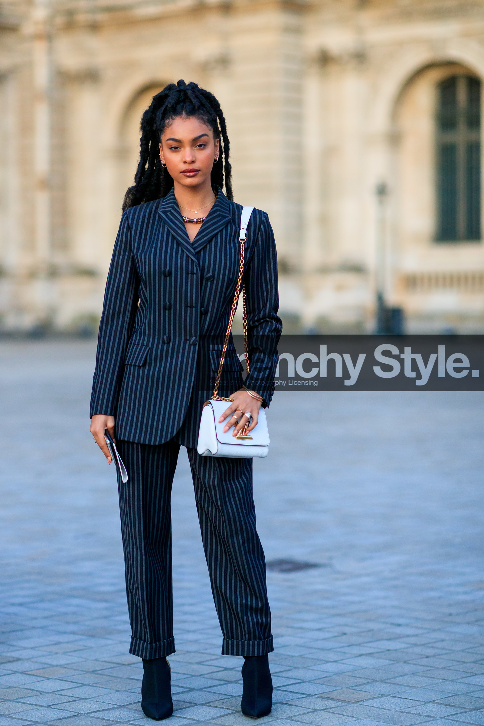 sharon alexie, louis vuitton bag, louis vuitton jacket, louis vuitton pants, striped jacket, striped pants, striped look, white leather bag, grey jacket, grey pants, navy blue jacket, navy blue pants, shoulder bag, golden chain strap bag, fashion week, frenchystyle, FW, jonathan paciullo, street style, PFW, PARIS, vertical, full length