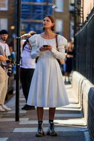 victoria sekrier, white dress, mid long dress, balloon sleeves, brown scale sunglasses, celine sunglasses, hoop earrings, golden earrings, long sleeves dress, brown leather bag, louis vuitton boots, louis vuitton sneakers, high sneakers, laced shoes, white leather shoes, white leather sneakers, golden sole, fashion week, frenchystyle, FW, jonathan paciullo, street style, vertical, full length