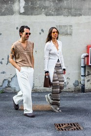 Alice Barbier, beige knit, beige pants, brown bag, brown clog, couple, duo, fluid pants, Jean-Sebastien Roques, knitted pants, leather bag, missoni look, orange sunglasses, printed pants, ribbed cardigan, sleveless knit, striped knit, sunglasses, white cardigan, white pants, v-neck knit, fashion week, frenchystyle, FW, jonathan paciullo, street style, MFW, MILAN, SPRING SUMMER 2022, SS 22, vertical, full length, menswear