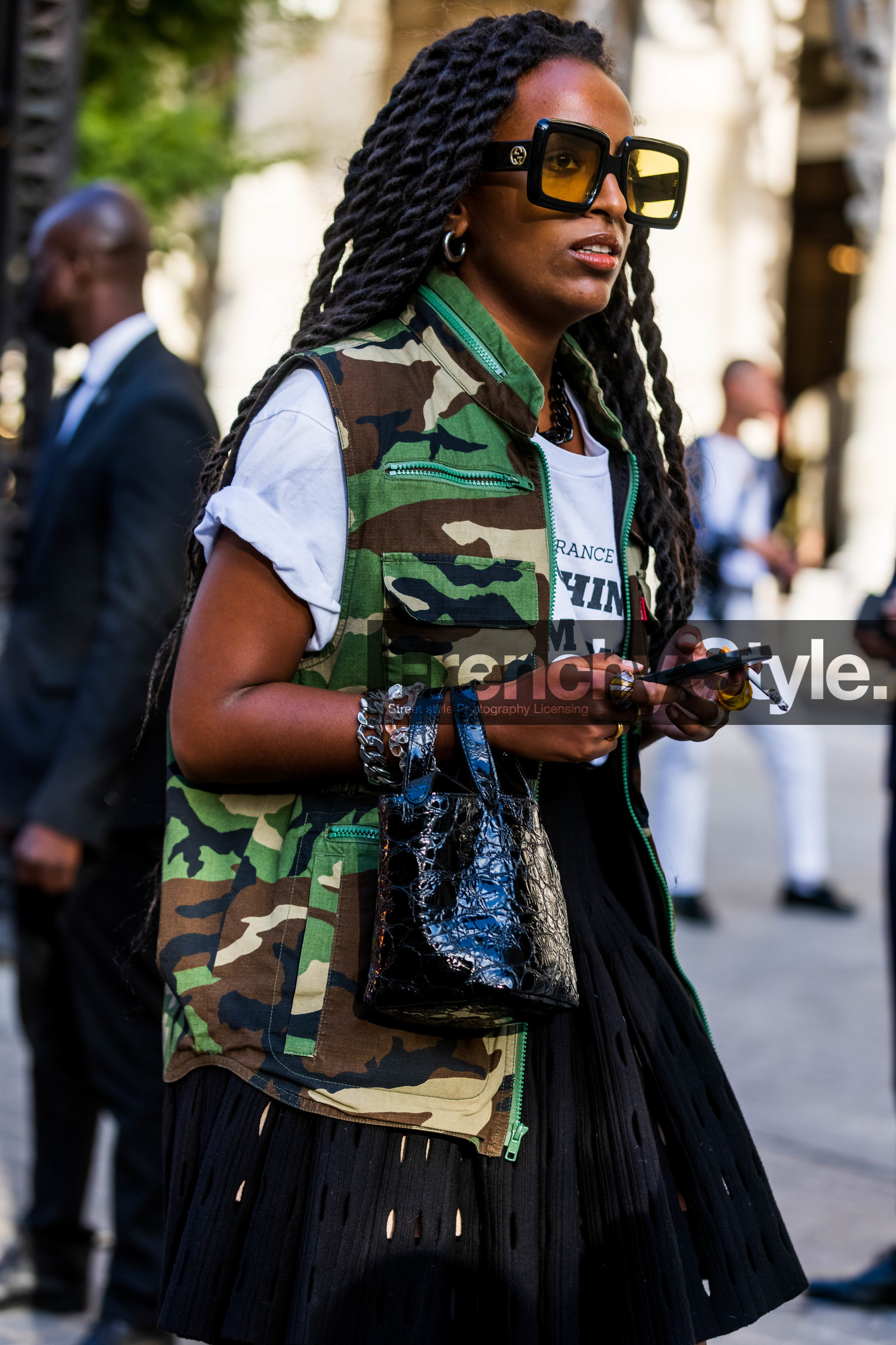 bag, black bag, black t-shirt, bracelet, chain necklace, dior bag, green skirt, leather bag, Lolo Zouai, necklace, pink hair, pleated skirt, printed t-shirt, saddle bag, skirt, t-shirt, vintage t-shirt, street style, jonathan paciullo, FW, frenchystyle, fashion week, PFW, PARIS, SPRING SUMMER 2022, SS 22, vertical, atmosphere details
