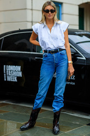 camille charriere, black sunglasses, butterfly sunglasses, white shirt, sleeveless shirt, black leather belt, plaited belt, denim, santiag boots, cowboy boots, brown leather boots, rolex watch, silver and golden watch, fashion week, frenchystyle, FW, jonathan paciullo, street style, vertical, full length