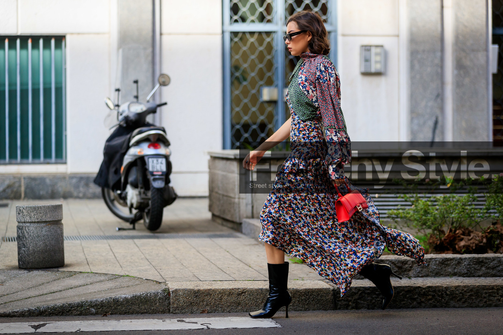 karina nigay, floral printed dress, asymetrical dress, high collar dress, long sleeves dress, sleeveless dress, ruffle dress, long dress, red leather bag, hand bag, balenciaga bag, black leather boots, squared toed shoes, square shape glasses, multicolor dress, fashion week, frenchystyle, FW, jonathan paciullo, street style, MFW, MILAN, AUTUMN WINTER 2020-2021, FALL WINTER 2020-2021, FW 20-21, horizontal, atmosphere details, full length