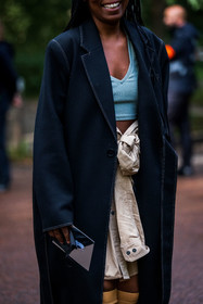 beige skirt, black coat, blue crop top, coat, crop top, Rajni Lucienne Jacques, skirt, street style, jonathan paciullo, FW, frenchystyle, fashion week, PFW, PARIS, SPRING SUMMER 2022, SS 22, vertical, atmosphere details