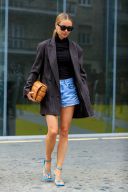 pernille teisbaek, celine sunglasses, black sunglasses, futurist shape sunglasses, black top, turtleneck top, zipped top, denim shorts, mini shorts, light blue denim shorts, striped jacket, dark grey jacket, oversize jacket, plaited bag, camel leather bag, bottega veneta bag, bottega veneta shoes, blue leather sandals, squared toed shoes, fashion week, frenchystyle, FW, jonathan paciullo, street style, MFW, MILAN, SPRING SUMMER 2020, SS 20