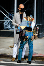 details, multiprinted denim pants, chunky black boots, multi printed patch work poncho, dark sunglasses, white and black plaid coat, camel suede boots, fashion week, frenchystyle, FW, jonathan paciullo, street style, NYFW, NEW YORK, AUTUMN WINTER 2022-2023, FALL WINTER 2022_2023, FW 22-23, vertical, atmosphere details