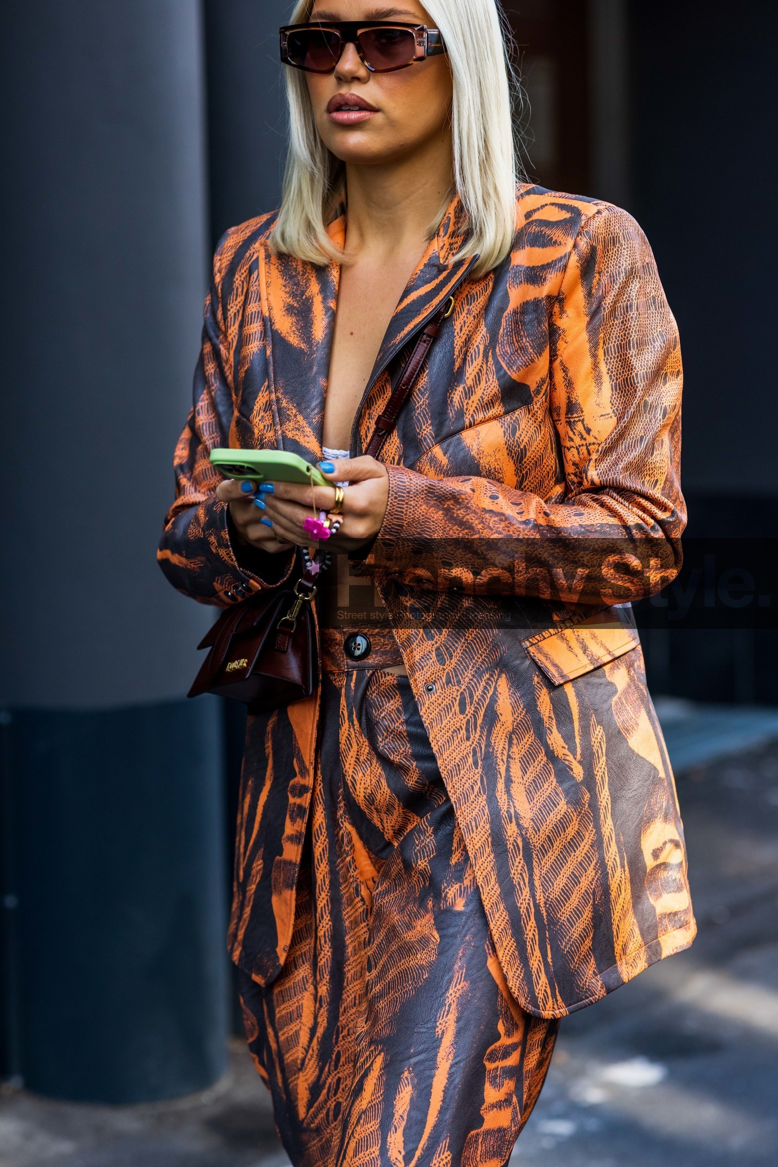 blazer, Caroline Ebo, jacquemus bag, leather bag, leather blazer, leather pants, orange blazer, orange pants, printed blazer, printed pants, red bag, smartphone, suit, sunglasses, fashion week, frenchystyle, FW, jonathan paciullo, street style, MFW, MILAN, SPRING SUMMER 2022, SS 22, vertical, atmosphere details, detail
