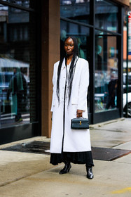 black handbag, doctors bag, black leather bag, black leather boots, black boots, minimal look, minimalist look, white trench coat, white coat, long trench coat, long braids, long black skirt, black skirt, Amy sall, fashion week, frenchystyle, FW, jonathan paciullo, street style, NYFW, NEW YORK, AUTUMN WINTER 2022-2023, FALL WINTER 2022_2023, FW 22-23, vertical, full length, model