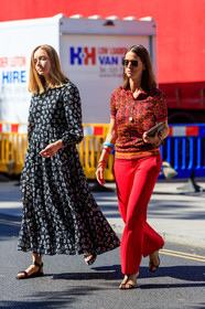emily zak, floral printed dress, black dress, loose dress, long dress, black sandals, flat sandals, iwatch, aviator sunglasses, metalic frame sunglasses, jacquard polo shirt, red polo shirt, red pants, tailored pants, louis vuitton bag, monogrammed bag, plastic bracelet, blue bracelet, red bracelet, brown scale bracelet, multi bracelet, long necklace, chain necklace, fashion week, frenchystyle, FW, jonathan paciullo, street style, vertical, full length