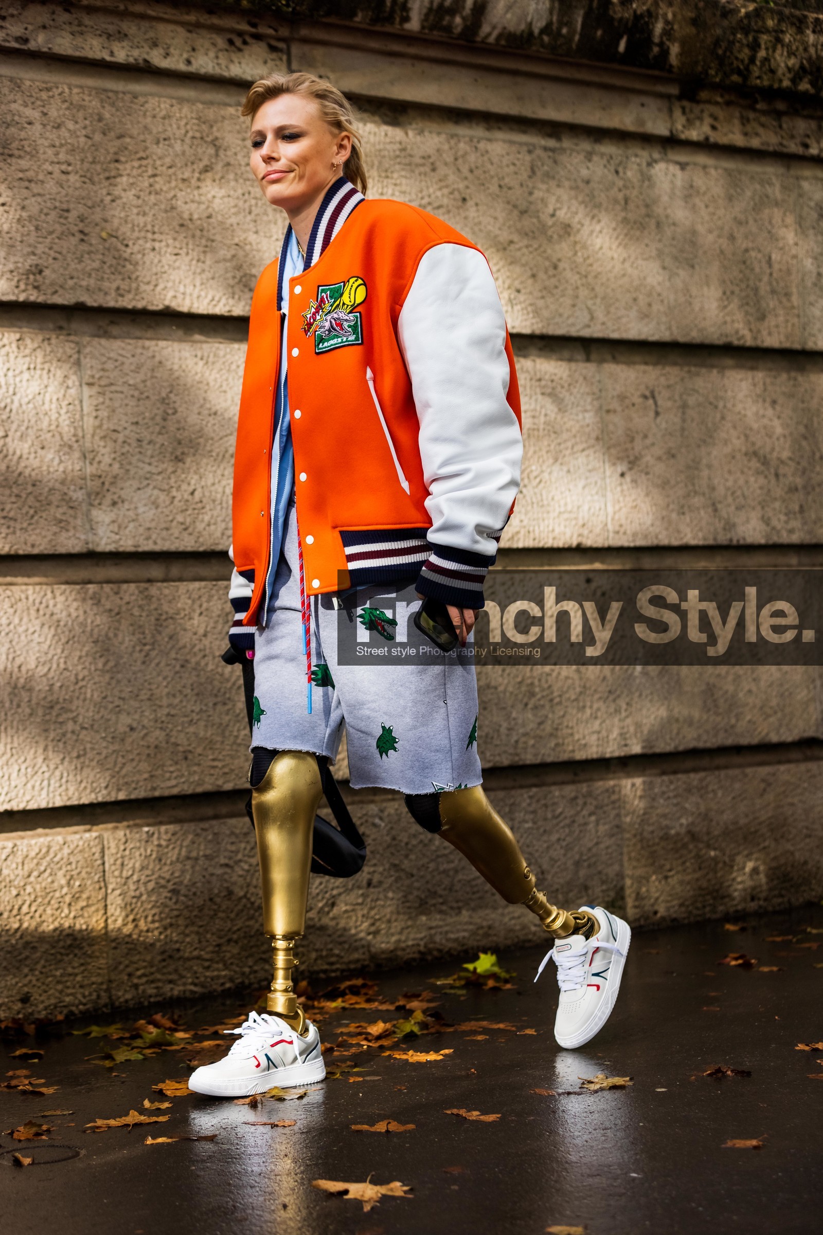 bag, beltbag, black bag, bomber, color, grey shorts, jogging, lacoste look, Lauren Wasser, orange bomber, shorts, sneakers, stripes, white sneakers, lacoste, fashion week, frenchystyle, FW, jonathan paciullo, street style, PFW, PARIS, SPRING SUMMER 2022, SS 22, vertical, full length