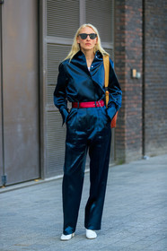 model, maggie maurer, square shape glasses, scale sunglasses, celine bag, shopping bag, shoulder bag, brown leather bag, navy blue jumpsuit, satin jumpsuit, satin shirt, satin pants, navy blue shirt, navy blue pants, red belt, satin belt, white leather boots, long sleeves shirt, oversize sleeves, tailored pants, fashion week, frenchystyle, FW, jonathan paciullo, street style, vertical, full length