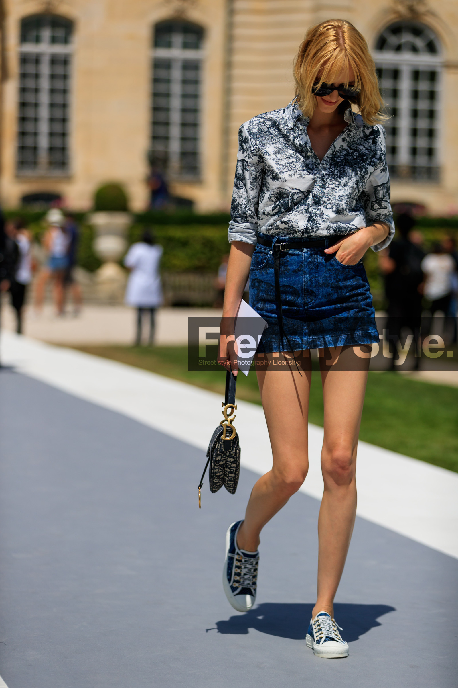black bag, black belt, black shoes, blue denim, blue sneakers, christian dior, denim skirt, graphic shirt, leather bag, leather belt, leather shoes, mini skirt, monogram, printed shirt, sunglasses, fashion week, frenchystyle, FW, jonathan paciullo, street style, PFW, PARIS, vertical, full length, model, AUTUMN WINTER 2018-2019, FALL WINTER 2018-2019, FW 18-19, daria strokous